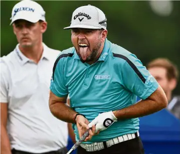  ??  ?? Tongue in cheek: Robert Garrigus reacts to his tee shot on the 17th hole during the first round of the Canadian Open at Glen Abbey Golf Club on Thursday. — AFP