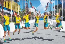  ??  ?? Cyclist Amy Cure and team-mates at the Athletes’ Village.