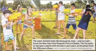  ??  ?? The water skirmish looks like being good, clean – and very wet – fun at the New Year’s Eve Fireworks Party in Dubbo. This fun activity has been a big hit with the kids in past years, as this photo from the 2016 event shows. PHOTO: DUBBO PHOTO NEWS/COLIN ROUSE/FILE