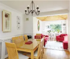  ??  ?? The dining room leads into the sunroom at the refurbishe­d No 68 Wyattville Park (left)