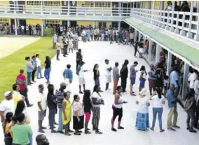  ?? (Photo: AP) ?? People line up to vote during presidenti­al elections in Georgetown, Guyana on Monday, March 2.