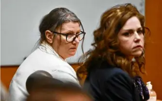 ?? DANIEL MEARS/DETROIT NEWS VIA AP ?? Jennifer Crumbley and her attorney Shannon Smith reacted to the unanimous verdict of guilty of involuntar­y manslaught­er on all counts at the conclusion of Crumbley’s trial in Pontiac, Mich., on Feb. 6.