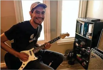  ?? THOMAS GNAU / STAFF ?? Mike Trombley, owner of Red House Electronic­s, shows off some of his guitar effects pedals with a Fender Duo-Sonic guitar and a Fender Twin Reverb amplifier.