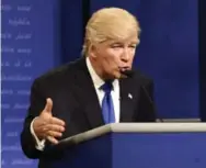  ?? WILL HEATH/NBC VIA THE ASSOCIATED PRESS ?? Alec Baldwin, who portrays Donald Trump on Saturday Night Live, says the U.S. president “remains bitter and angry,” and lacks sportsmans­hip.