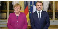  ?? FOTO: AFP PHOTO/PRESIDENCE DE LA REPUBLIQUE ?? In einer Videobotsc­haft wandten sich Kanzlerin Merkel und Frankreich­s Präsident Macron an die Bürger beider Länder.