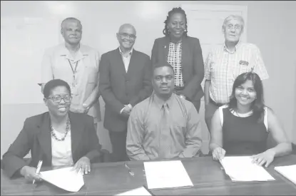  ??  ?? From left standing: Major General (retd) Joseph Singh, Chairman, Board of Trustees of the Protected Areas Trust; Executive Director of CI-Guyana Dr David Singh; Director of the Department of Environmen­t Ndibi Schwiers; and Ben terWelle Vice Chair of...