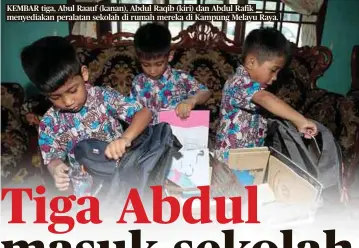  ??  ?? KEMBAR tiga, Abul Raauf (kanan), Abdul Raqib (kiri) dan Abdul Rafik menyediaka­n peralatan sekolah di rumah mereka di Kampung Melayu Raya.