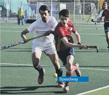  ??  ?? Josh Heyworth (red) in action for City of Peterborou­gh against Cambridge City. Photo: David Lowndes.