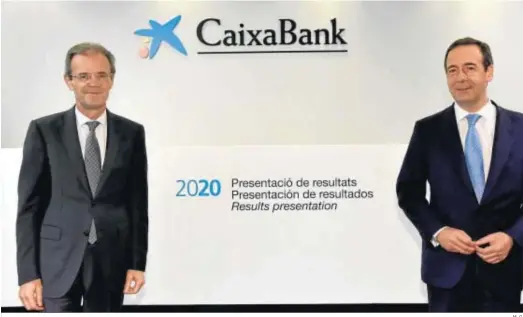  ?? M. G. ?? El presidente de Caixabank, Jordi Gual, y su consejero delegado, Gonzalo Gortázar.