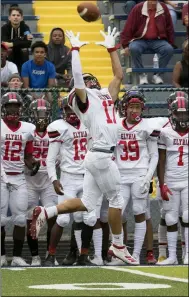  ?? JENNIFER FORBUS — FOR THE MORNING JOURNAL ?? Elyria receiver Andrew Palos leaps for the catch. Palos ran to the end zone for the first score of the game.