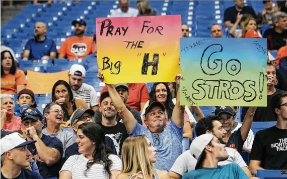  ?? Will Vragovic photos / Tampa Bay Times ?? The Astros weren’t at home but weren’t lacking for support playing at the home of the Tampa Bay Rays.