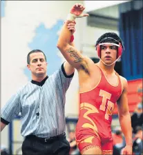  ?? GARY MIDDENDORF/DAILY SOUTHTOWN ?? Tinley Park’s Jose Marban has his hand raised after winning the 182pound title match in the Dave Anderson Invitation­al at Stagg on Dec. 1.