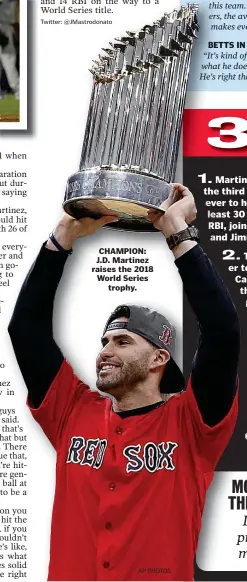  ??  ?? CHAMPION: J.D. Martinez raises the 2018 World Series trophy.