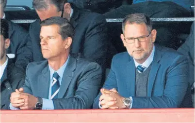  ?? ?? Tim Keyes (left) and John Nelms watch the Dark Blues draw with St Johnstone on Saturday.