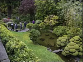  ?? ?? Visitors wander the manicured pathways at the Japanese Tea Garden in San Francisco.