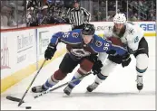  ?? JOE MAHONEY — ASSOCIATED PRESS ?? Colorado Avalanche right wing Mikko Rantanen carries the puck against Sharks center Joe Thornton.