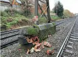  ?? NETWORK RAIL ?? Right: Damaged brickwork at the base of the supports of a footbridge over the South Western Main Line near Woking which leads to Woking Golf Club.