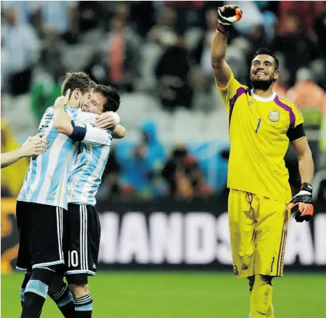  ?? NATACHA PISARENKO/THE ASSOCIATED PRESS ?? Argentina’s Lionel Messi is hugged by Lucas Biglia while goalkeeper Sergio Romero celebrates their win on Wednesday.