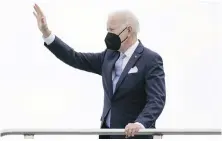  ?? AP ?? U.S. President Joe Biden, seen boarding Air Force One, has not issued fresh travel warnings nor urged the cancellati­on of public events, despite a surge in Omicron cases in the U.S. and around the world.