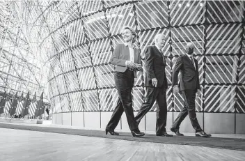  ?? Doug Mills / New York Times ?? President Joe Biden walks with European Council President Charles Michel and European Commission President Ursula von der Leyen at a summit in Brussels last month.