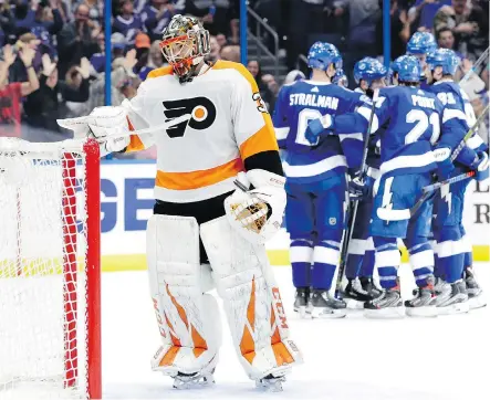  ?? THE ASSOCIATED PRESS/FILES ?? Michal Neuvirth, who has been injured for much of the season, is one of seven goalies the Philadelph­ia Flyers have employed between the pipes in just 43 games so far this NHL campaign.