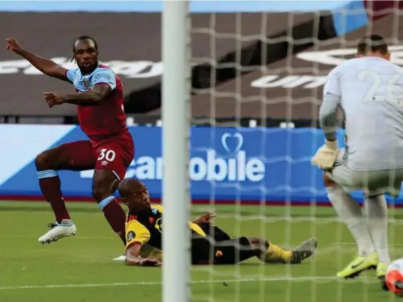  ??  ?? Michail Antonio opens the scoring against Watford (2020 Pool)