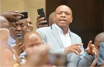  ?? ITUMELENG ENGLISH African News Agency (ANA) ?? FORMER North West premier Supra Mahumapelo is seen addressing members of the ANC after winning a court challenge. Mahumapelo is to be effectivel­y reinstated as ANC chairperso­n in the province. |