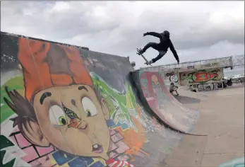  ?? PICTURES: MOTSHWARI MOFOKENG ?? Durban skateboard­er, Khule Ngubane, 23, who is making a name for himself internatio­nally, skating at a beachfront skateboard park.