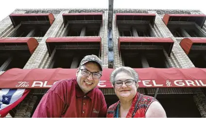  ?? Photos by Bob Owen / Staff photograph­er ?? Don Page is the current owner of the Alcade Hotel in Gonzales, east of San Antonio, and Deidra Voigt is the former owner. Voigt’s grandparen­ts built the facility in 1926. It is the first historical franchise for the OYO chain.