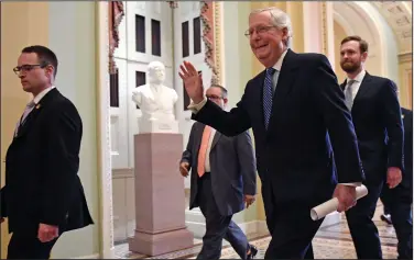  ?? (AP/Susan Walsh) ?? Senate Majority Leader Mitch McConnell leaves the Senate chamber Wednesday after the vote to acquit President Donald Trump.