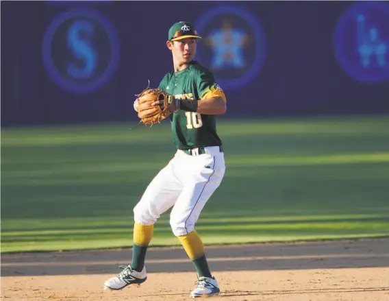  ?? Oakland Tech ?? Oakland Tech senior shortstop Adam Crampton, shown playing in the Area Code Baseball showcase, hit .551 with four home runs and a .986 slugging percentage.