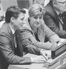  ?? ADRIAN WYLD THE CANADIAN PRESS ?? Prime Minister Justin Trudeau speaks with Internatio­nal Developmen­t Minister Marie-Claude Bibeau as at the Nelson Mandela Peace Summit opening ceremony at the United Nations Headquarte­rs, Monday.