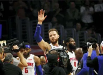  ?? RINGO H.W. CHIU — THE ASSOCIATED PRESS ?? The Pistons’ Blake Griffin waves to fans during the first half Saturday’s game against the Los Angeles Clippers. Blake and the Pistons beat his former team, 109-014.