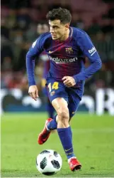  ?? ENRIC FONTCUBERT­A/EPA ?? KANS PELAPIS: Philippe Coutinho ketika menghadapi Valencia di semifinal Copa del Rey (1/2).