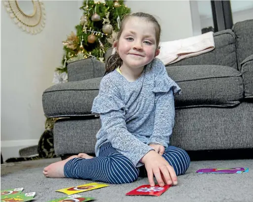  ?? DOUG FIELD/STUFF ?? Romy Hurst, 7, has been doing well since her cochlear implant surgery in August.