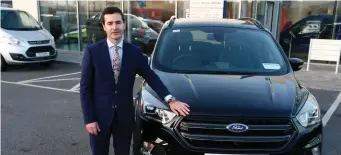  ??  ?? Right: Kieran Griffin Sales and Marketing Manager Kerry Motor Works with the all new 2017 BFORD KUGA ST LINE.