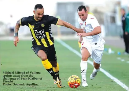  ??  ?? Michael Mifsud of Valletta sprints away from the challenge of Sean Klaiber of Utrecht Photo: Domenic Aquilina