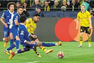  ?? Clinical: dortmund’s ian Maatsen scoring the second goal against atletico Madrid in their Champions league quarter-final second leg match. — afp ??