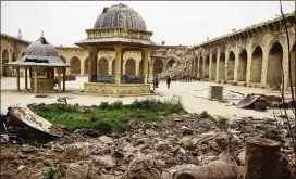  ?? ALFRED YAGHOBZADE­H / ABACA PRESS ?? Six years of war in Syria have displaced millions of people and damaged many buildings, including the Grand Umayyad Mosque in Aleppo.