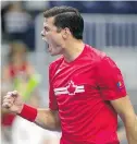  ?? CHRIS YOUNG, THE CANADIAN PRESS ?? Milos Raonic clinched Canada’s victory over the Netherland­s with a win over Scott Griekspoor on Sunday in Toronto.