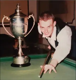  ??  ?? Rodney Goggins with the trophy after his world Under-21 championsh­ip win in 1999.