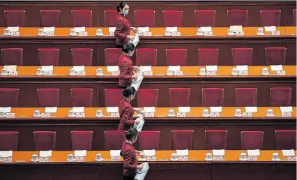  ?? Picture:
CELIS/AFP NOEL ?? PARTY PEOPLE: Attendants serve tea for delegates before the start of the second plenary session of the National Peoples Congress, in the Great Hall of the People, in Beijing yesterday. The gathering had been postponed since March due to the Covid-19 pandemic