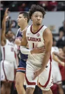  ?? VASHA HUNT – AP ?? Senior guard Mark Sears' 22points and eight assists led Alabama in a victory against visiting SEC rival and No. 8-ranked Auburn.