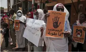  ?? Photograph: Marwan Ali/AP ?? Women protest against violence against women, including sentences for stoning for adultery, in front of the UN office in Khartoum, Sudan.