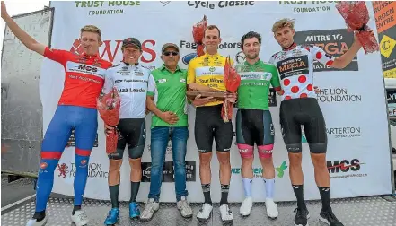  ??  ?? Race organiser Jorge Sandoval, third from left, with classifica­tion jersey winners at the New Zealand Cycle Classic including overall tour winner Rylee Field in the yellow jersey and holding the winner’s trophy.