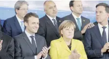  ?? Ansa ?? In seconda fila Gentiloni dietro Macron e Merkel