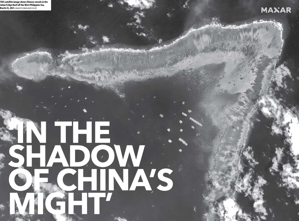  ?? MAXAR TECHNOLOGI­ES VIA AP ?? THIS satellite image shows Chinese vessels in the Julian Felipe Reef off the West Philippine Sea, March 23, 2021.