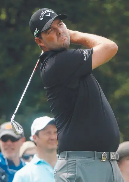  ?? Picture: AFP ?? Australia’s Marc Leishman hits off during a practice round before the 2017 PGA Championsh­ip.