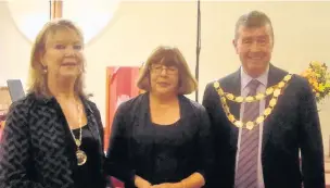  ??  ?? ●●From left are, deputy mayoress of Stockport, Maureen Brett, Catherine Eckersley, secretary of Stockport United Nations Associatio­n and Coun Walter Brett, the deputy mayor of Stockport