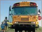  ?? RECORD FILE PHOTO ?? School bus drivers and police across New York state are teaming up Thursday for the 24th annual Operation Safe Stop Day, during which they will mount enforcemen­t and education efforts to reduce incidents mof drivers illegally passing stopped buses.